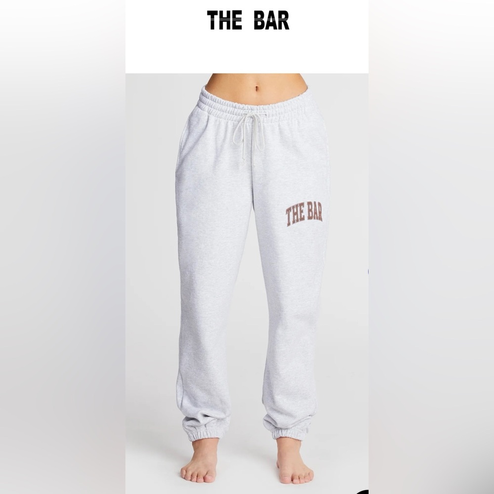 The bar sweatpants washed, never worn, grey/chocolate brown. Size medium.